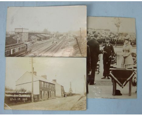 Approximately 300 postcards in two albums, including RPs of George V and Queen Mary; GWR station, Newbury; a 1905 "Scene of a
