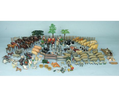 A large quantity of Britains and Johillco lead farm animals, farm workers, fences, trees etc.