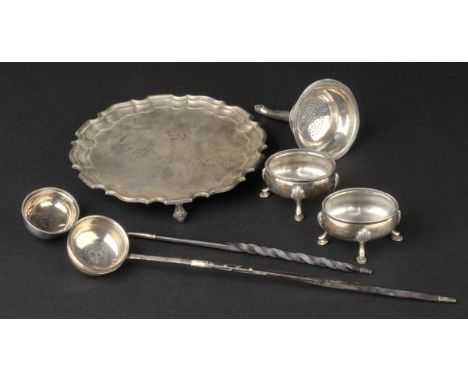 *Mixed Silver. An Edwardian silver salver by Henry Stratford Ltd, Sheffield 1911,  with shaped edge on three scroll feet, 20.