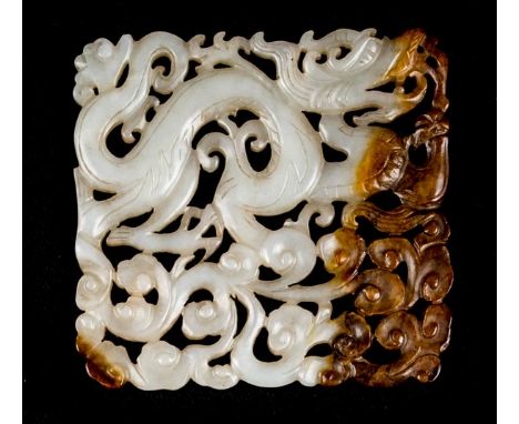 *Jade Carving. A Chinese carved jade panel,  of square form finely carved with a dragon, with ochre, approx. possibly Ming Dy