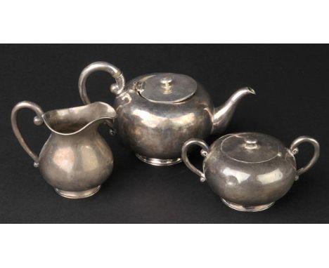 *Tea Set. An American silver bachelors tea set circa 1920s,  comprising teapot, milk jug and lidded sugar bowl all with a ham