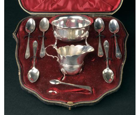 *Tea Service. A Victorian silver tea service by Goldsmiths & Silversmith Ltd, London 1896,  comprising milk jug, sugar bowl w