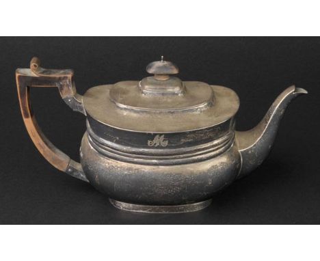 *Teapot. A Victorian silver teapot, by Edward Barnard & Sons, London 1896,  of oblong form with fruitwood handle, 29cm long, 