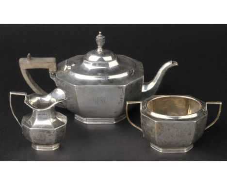 *Tea Set. A George V silver three piece tea set, by Albert Faulkner, Sheffield 1919,  comprising teapot, milk jug and sugar b