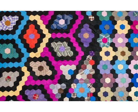 *Quilt. A black quilt, early 20th century,  square black cotton quilt worked by hand in black thread, with a central star mot
