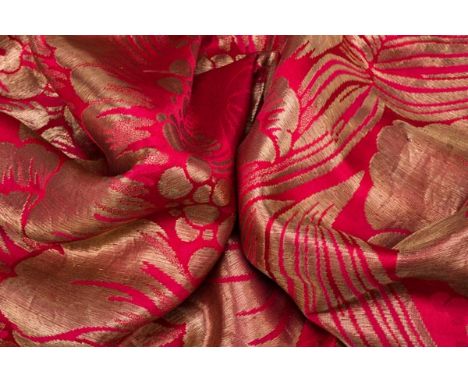 *Shawl. A large lam‚ brocade shawl, circa 1920s,  scarlet silk brocade shawl with ornate large-scale floral and foliate desig