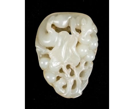 *Jade Carving. A Chinese white and russet jade pebble,  carved as a squirrel and grapes, Qing Dynasty, 5cm long  (1)