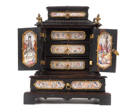 *Table Cabinet. A late 19th century Continental ebonised table cabinet probably Viennese,  of architectural form with enamel 