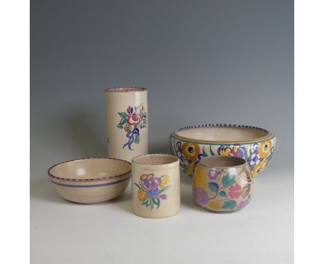 A large quantity of Poole Pottery, decorated in typical style, comprising some Carter, Stabler and Adams pieces, including Va
