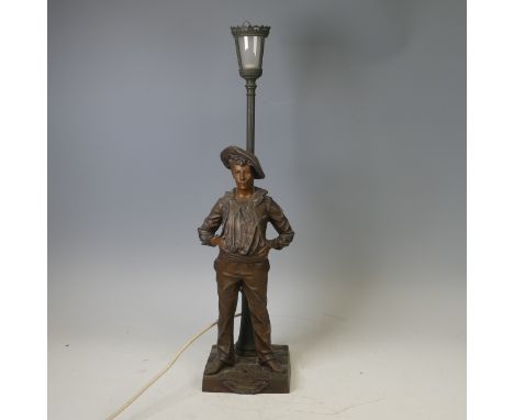 A French spelter table Lamp, modelled as a sailor, inscribe to base 'Millard', H 66 cm.