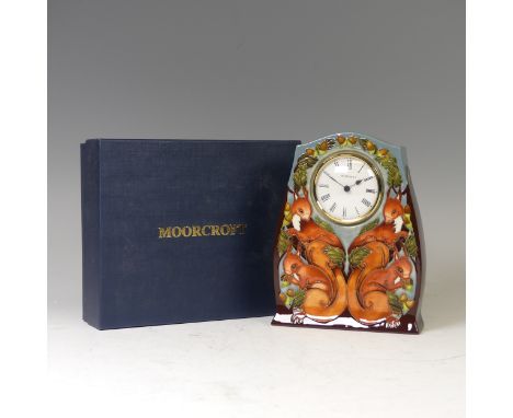 A Moorcroft limited edition 'Red Squirrels' mantel clock, dated 2012, numbered 6/75, painted and impressed marks, 21cm high, 