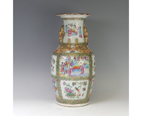A late 19thC Chinese porcelain famille rose Vase, of baluster form, decorated with varying panels of interior scenes and flor