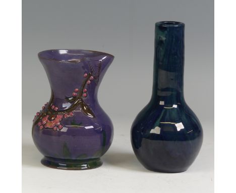 A Sunflower Pottery Vase, in purple ground with floral decoration indistinct signature to base, probably for Sir Edmund Elton