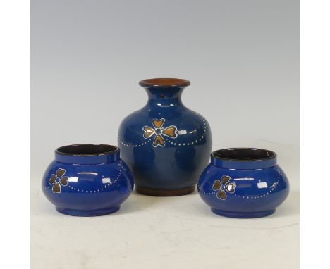 A small quantity of F H Honiton Pottery, to comprise a pair of Cache Pots, in blue ground with floral motifs and dotted swags