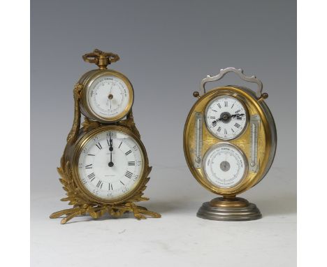 A Victorian combination Clock/Barometer, housed in gilt brass case applied with wreath mounts, retailed by Loveday, Wakefield