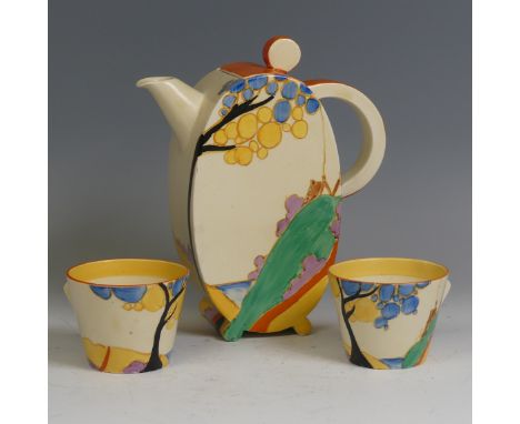 A pair of Clarice Cliff ‘Seven Colour Secrets’ pattern Coffee Cups, in the Bonjour shape, one with small hairline,&nbsp;print