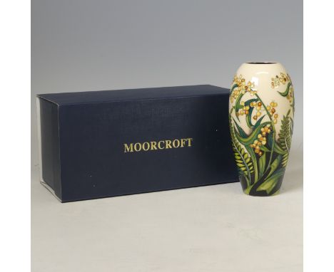 A Moorcroft pottery ‘Golden Wattle and Silver Fern’ pattern vase, 2012, by Nicola Staney, painted and impressed marks, 19cm h