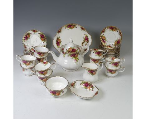 A Royal Albert 'Country Roses' pattern Tea Service, including; Teapot, ten cups, twelve Saucers, sugar Bowl, cream Jug, etc(a