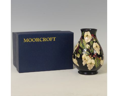 A Moorcroft pottery "Mountain Gold" pattern vase, 2003, by Sian Leeper, 13.5cm high, with original box.