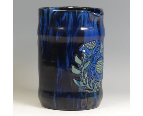 Sir Edward Elton; a Sunflower Pottery Jug, decorated in trickles of dark blue, light blue and greens, with stylised heart-sha
