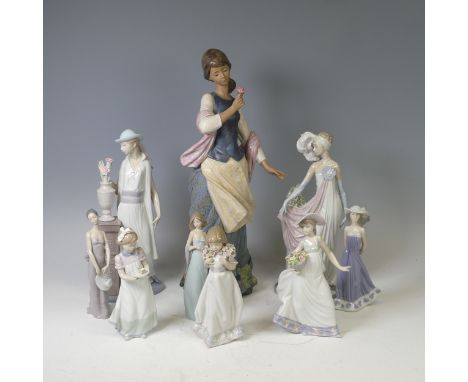 A large boxed Lladro figure of 'A Girl in Love' No 2393, together with eight other Lladro figures five being in original boxe