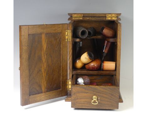 A 20th century smokers Box, together with a quantity of Pipes, including; Dr Plumb, Meerschaum, Flacon, Eagle, R. Martin, etc
