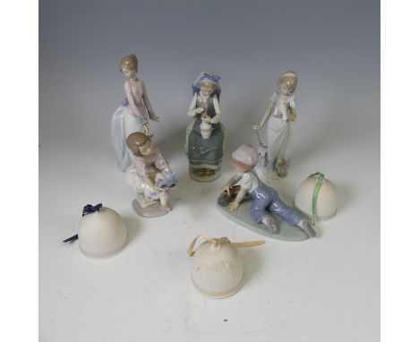 A boxed Lladro figure of&nbsp;'Flower Harmony' No 1418, together with seven other boxed Lladro Figures, including; 'All Aboar