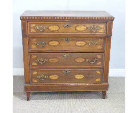 An early 19th century Dutch walnut and marquetry Chest of four drawers, decoratively inlaid with; flowers, shells, chequered 