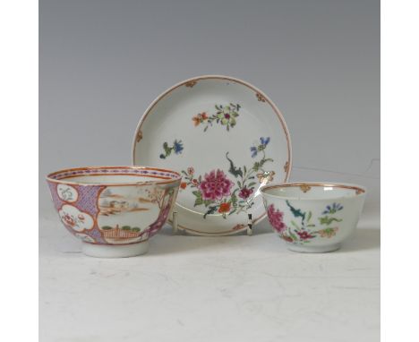An early 19thC Chinese porcelain famille rose Tea Bowl and Saucer, decorated with enamels of flora enclosed within red and gi