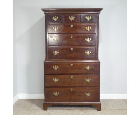 A Georgian mahogany Chest on chest, the upper section with moulded cornice above three short drawers and three long drawers, 