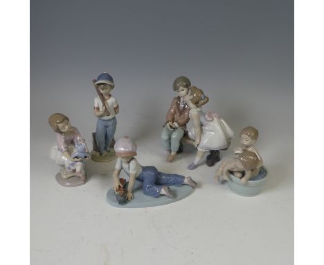 Five boxed Lladro Figures, including; 'Ten and Growing' 7635, 'Can I Play?' 7610, 'Bath Time' 6411, 'All Aboard' 7619, 'Best 