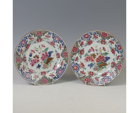 A pair of 18thC Chinese famille rose porcelain export Plates, decorated with flora in colourful enamels of pinks and blues, D