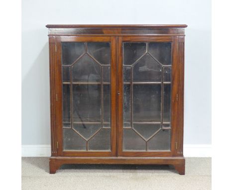 An Edwardian mahogany astragal glazed Bookcase, raised on bracket feet, W 106 cm x H 105 cm x D 37.5 cm.