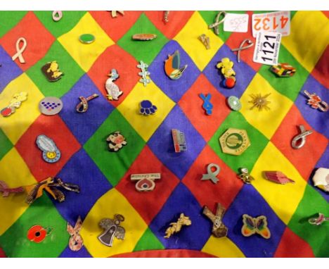 Fifty pin badges, mostly Cancer Research and Pudsey. UK P&amp;P Group 1 (£16+VAT for the first lot and £2+VAT for subsequent 