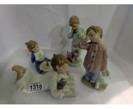 Four Nao figurines, largest H: 20 cm. Not available for in-house P&amp;P