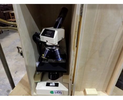 Cased Swift M3200 microscope. UK P&amp;P Group 3 (£30+VAT for the first lot and £8+VAT for subsequent lots) 