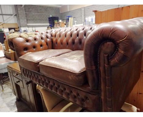 Distressed Chesterfield two seat sofa. Not available for in-house P&amp;P 