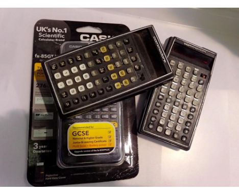 Factory sealed Casio FX-85GTX calculator and two Commodore calculators. UK P&amp;P Group 1 (£16+VAT for the first lot and £2+