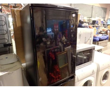 Hotpoint fridge freezer, First Edition. All electrical items in this lot have been PAT tested for safety and have passed. Thi