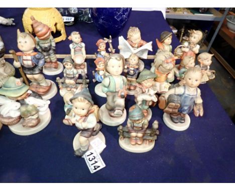 Eighteen Goebel figures, some with damages. Not available for in-house P&amp;P