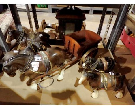 Group of five ceramic shire horses in work harnesses, the largest example having a wooden cart. Not available for in-house P&
