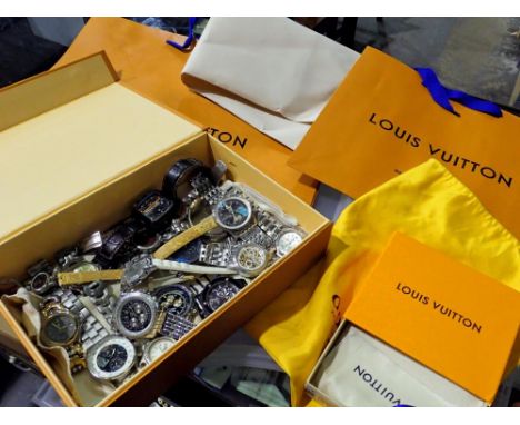 Collection of ladies and gentleman's fashion watches to include fashion dust bags and boxes. UK P&amp;P Group 1 (£16+VAT for 
