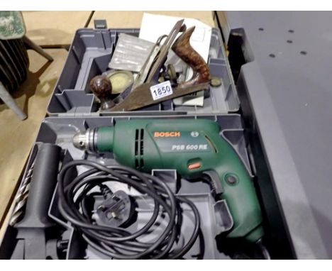 Boxed Bosch PSB 600 RE corded drill and wooden plane, tested and working. All electrical items in this lot have been PAT test
