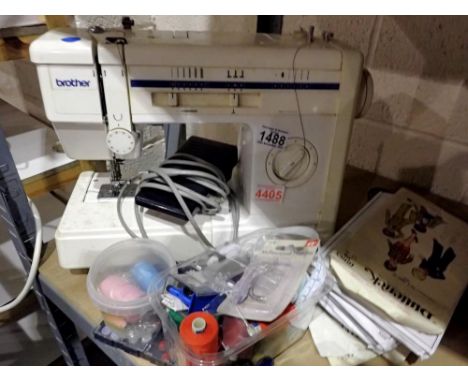 Brother electric sewing machine with power cable, pedal and sewing patterns. All electrical items in this lot have been PAT t