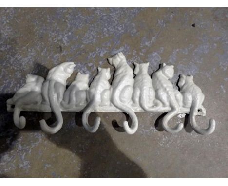 Cast iron cat tail coat hanger, L: 36 cm. UK P&amp;P Group 2 (£20+VAT for the first lot and £4+VAT for subsequent lots)