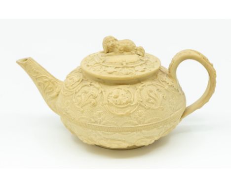 A Wedgwood caneware small tea pot with dog finial and moulded detail, approx. 7.5cm high.&nbsp;Provenance: From a single owne