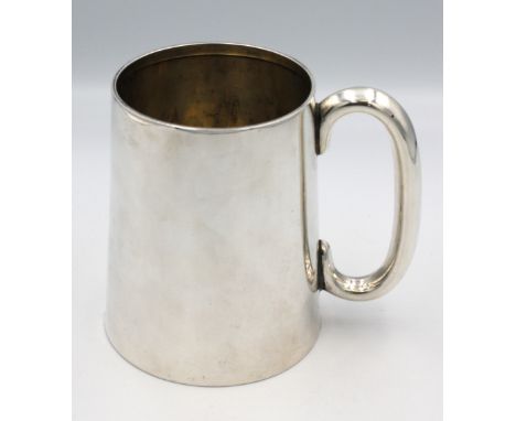A George V silver tankard / large mug, of plain design with C shaped handle, hallmarked by Sharman D Neill Ltd, Chester, 1919
