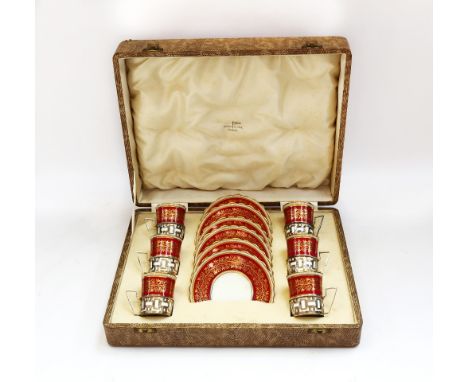 Aynsley: a cased set of 6 coffee cans in silver mounts with 6 saucers. Silver presentation plaque to case dated 1957. Walker 