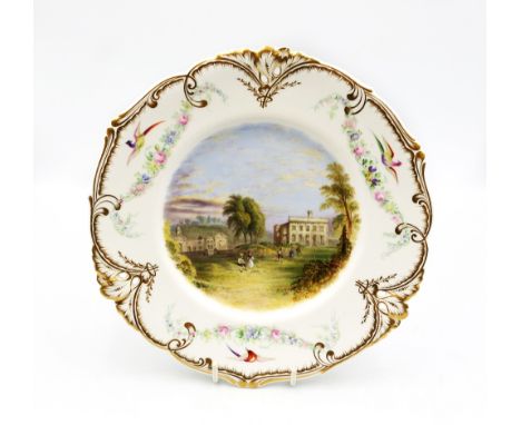 A Kerr and Binns Worcester plate painted with figures before Dargan Castle.