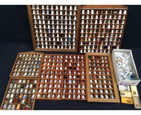 A mixed collection of ceramic and other thimbles, mixed colourways, designs and scenes, (Q in 1 box)